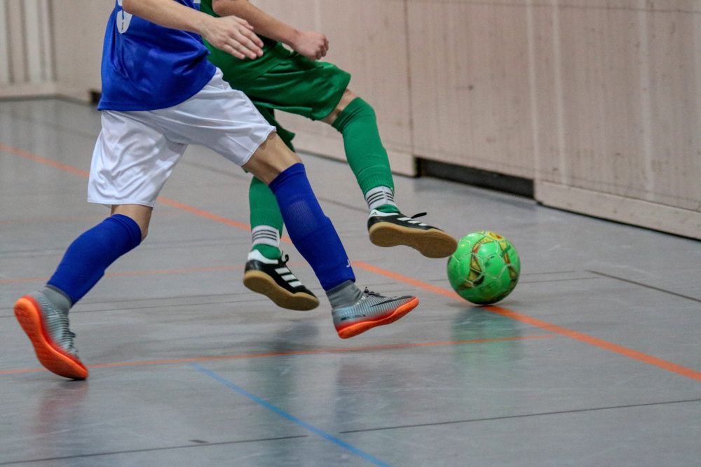 Giocatori di futsal calcio a 5 partita 